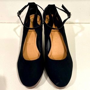 NWOT size 11 black suede pumps with wood platform heels.